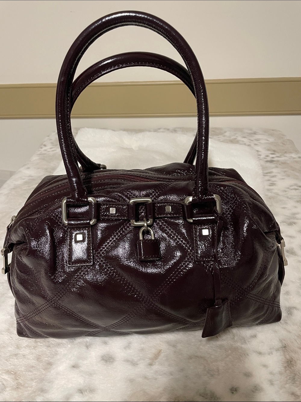 Burgundy patent leather padlock bag